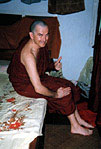 Monk on a bed